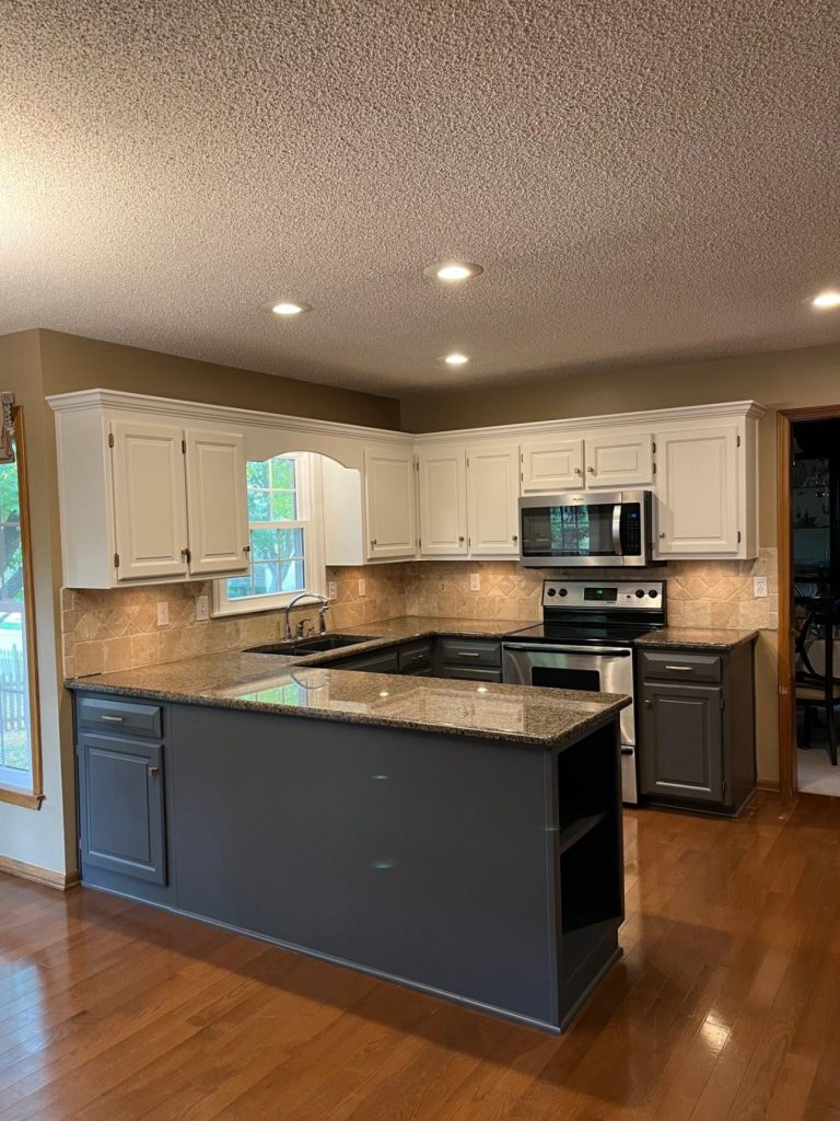 image of a kitchen with white cabinets