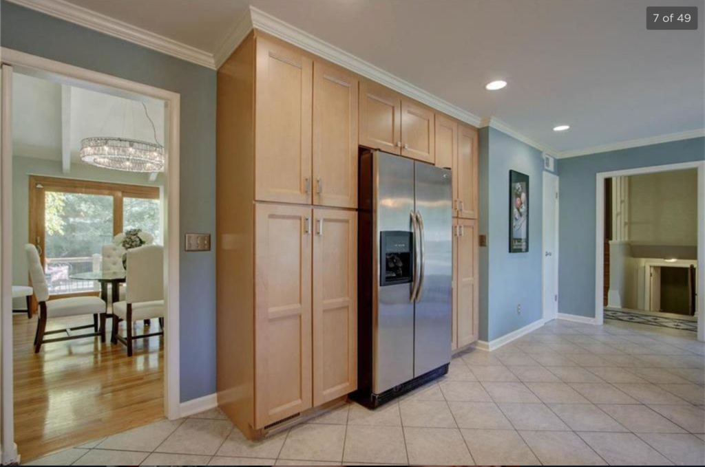 image of a kitchen with light brown cabinets