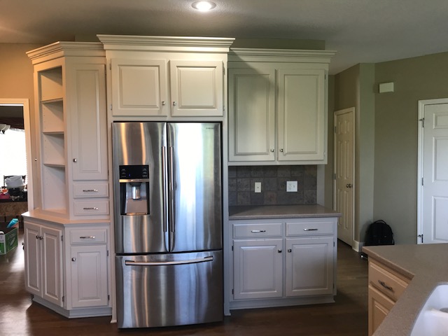 image of a kitchen with white cabinets