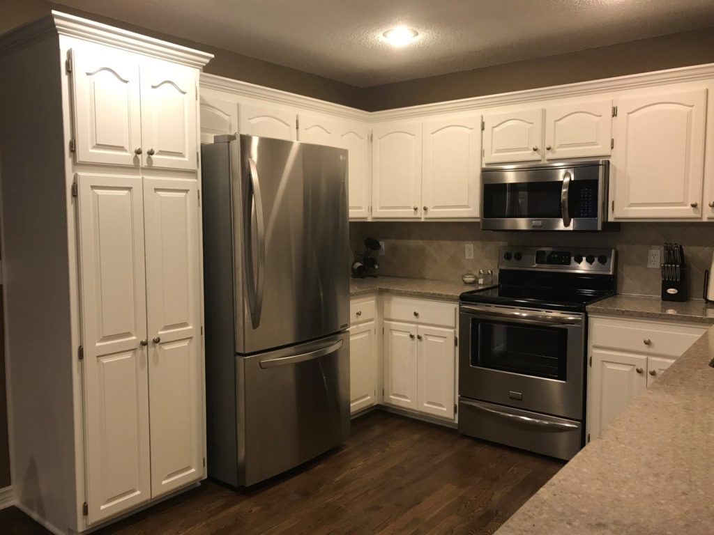 image of a kitchen with white cabinets