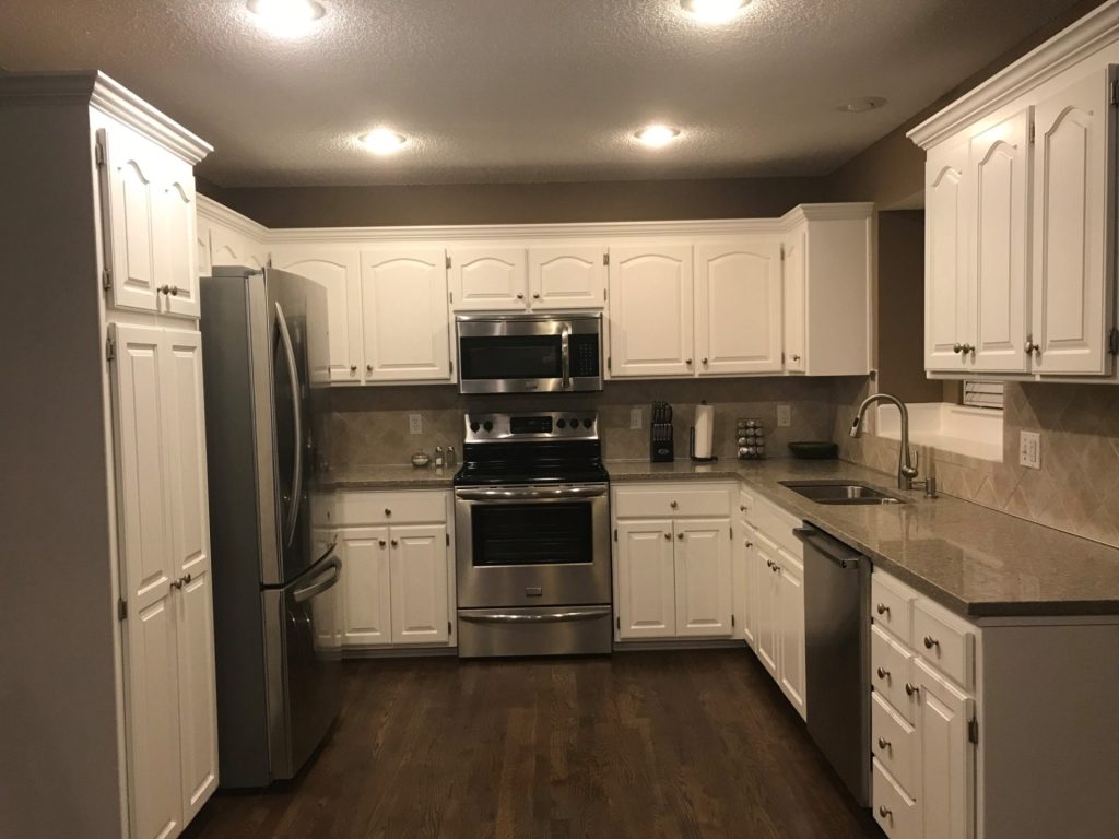 image of a kitchen with white cabinets