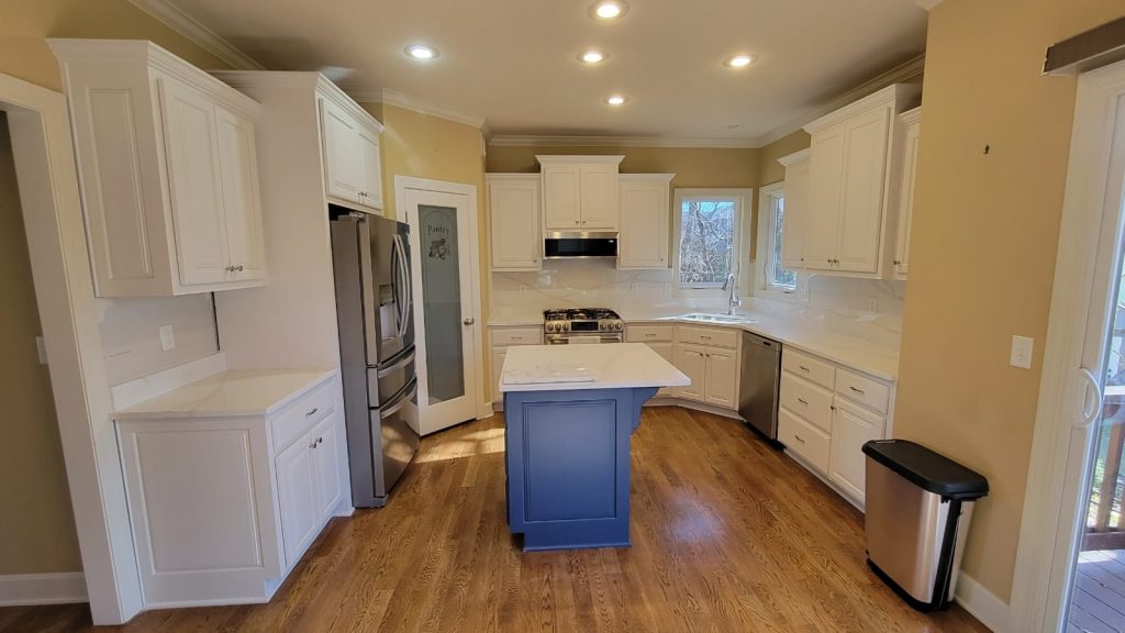 image of a kitchen with white cabinets