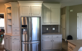 image of a kitchen with white cabinets